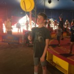 Tim trying to learn to spin a plate.