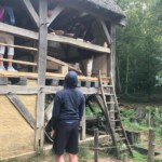 Ben looking up at the water mill