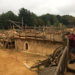 Nate looking down into the courtyard, construction all around us